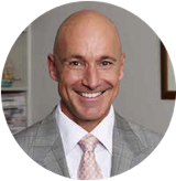 Reader smiling after reading A New Approach to Headache and Migraine by Pablo.