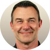 Person smiling, representing a positive treatment experience.